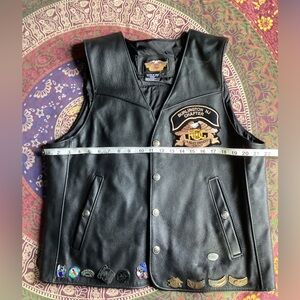 Harley-Davidson black leather vest, size large with patches and pins